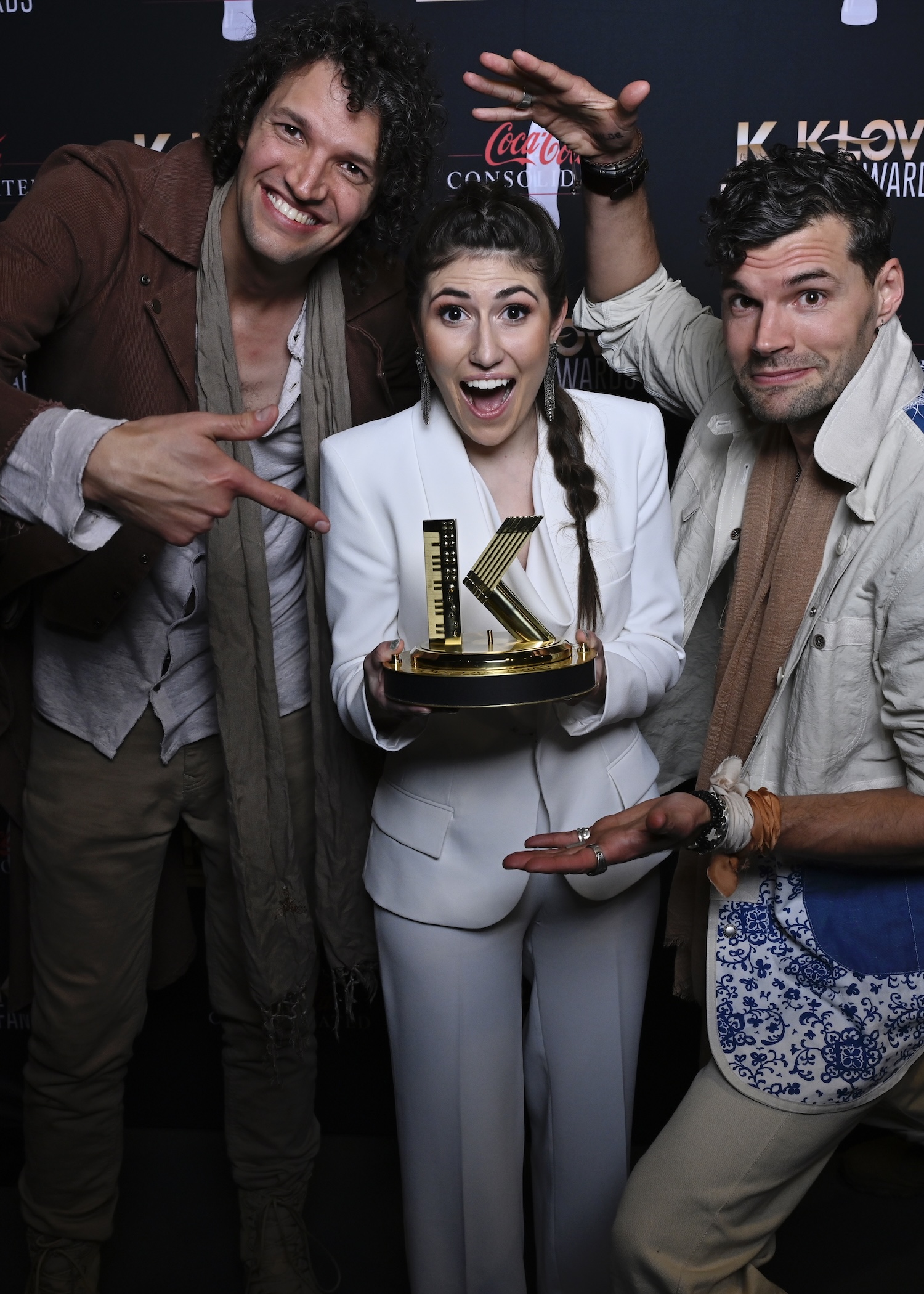 Katy Nichole holding her first K-LOVE Fan Award with for KING and COUNTRY