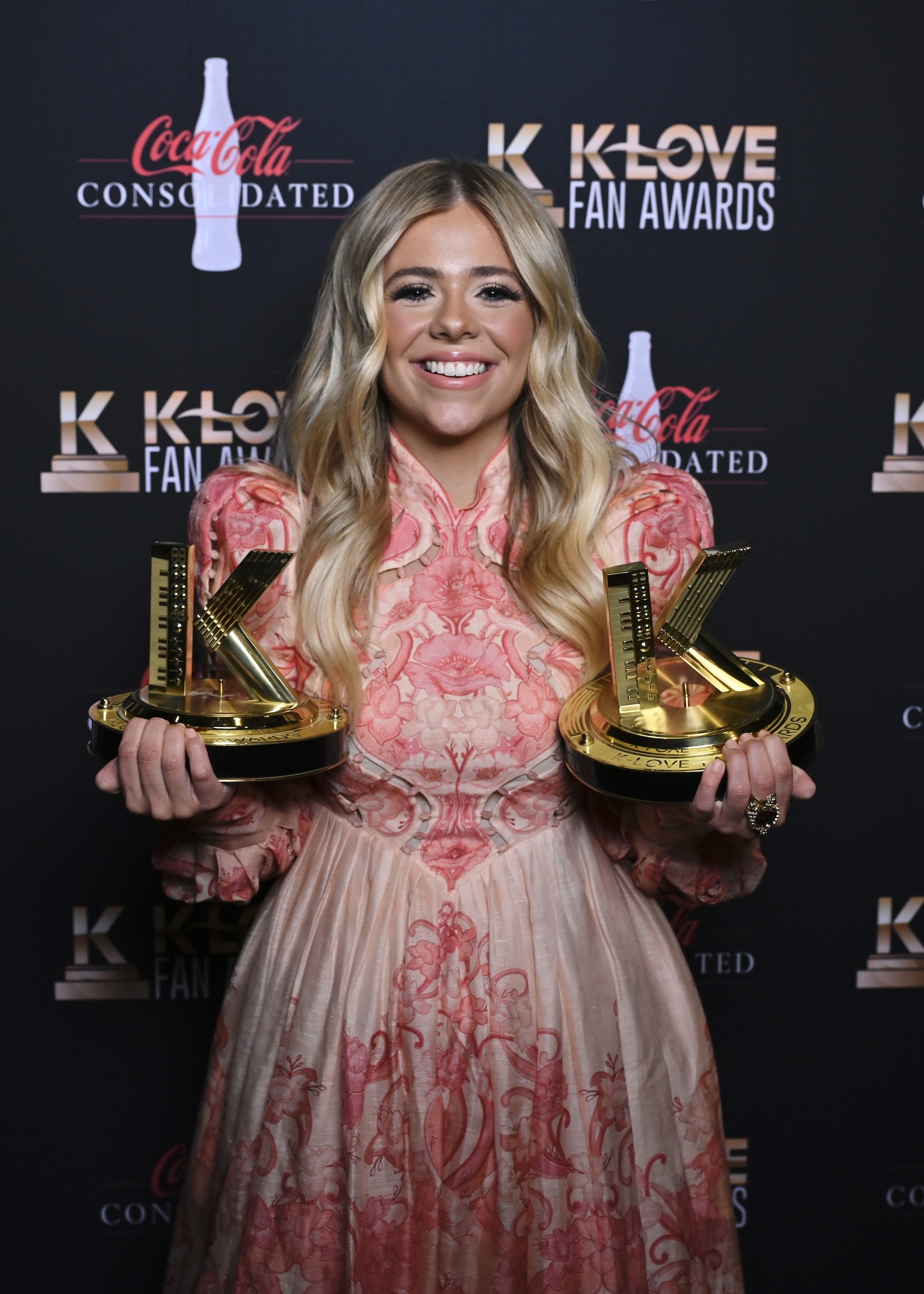 Anne Wilson holding her two K-LOVE Fan Awards