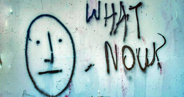 graffiti art, worried face with question "What now?"