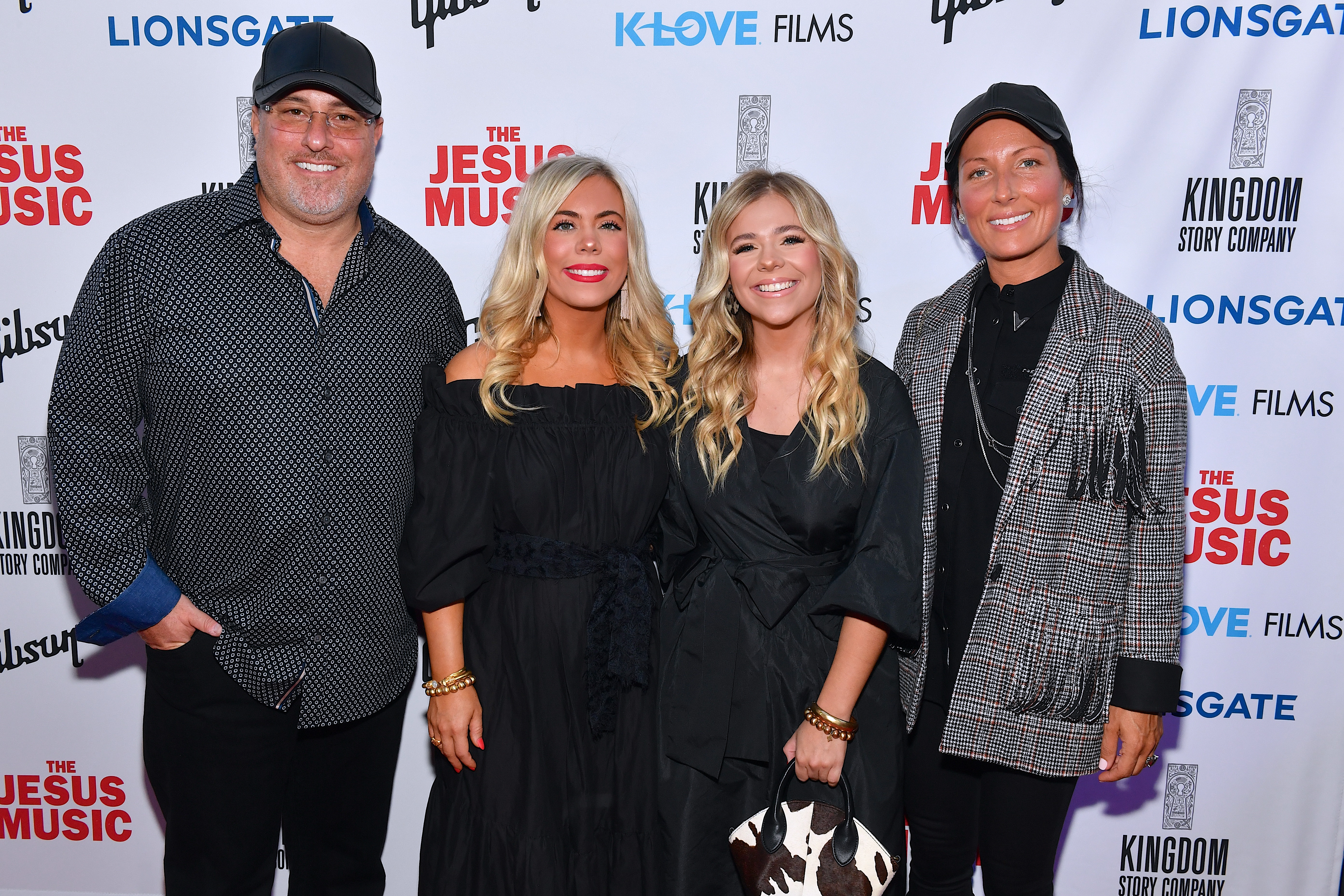 Jason Davis, Elizabeth Wilson, Anne Wilson, and Heather Davis arrive at the premiere of Lionsgate