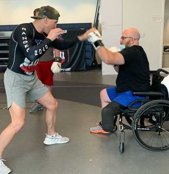 Disable vet amputee in wheelchair trains as a boxer