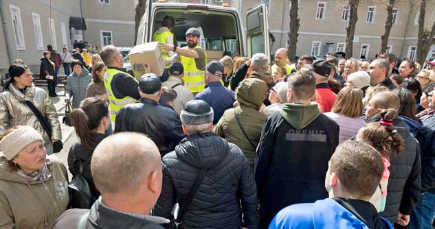 Convoy partners distribute supplies to war refugees in Romania