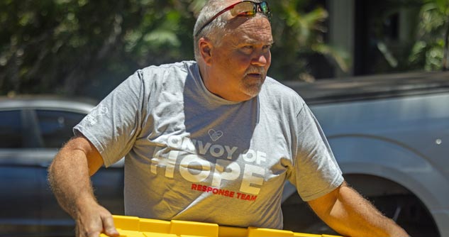 Convoy volunteer carries supplies for fire survivors in Lahaina, West Maui (8-20-2023)