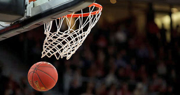 Basketball just made it through hoop to score