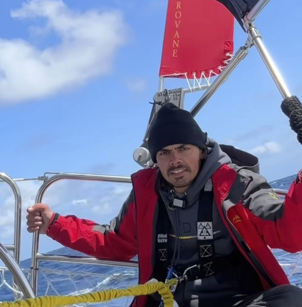 Widger talks to the camera somewhere in the Pacific Ocean as he and his cat, Phoenix, sail from Oregon to Hawaii.