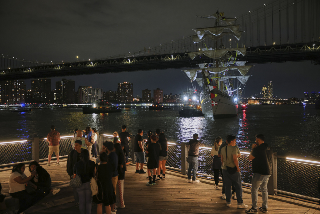 The vessel, which was flying a giant Mexican flag and had 277 people aboard, then drifted into a pier on the riverbank as onlookers scrambled away.