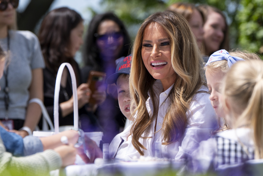 First lady Melania Trump participates in flag decorating during a Take Our Child to Work Day event