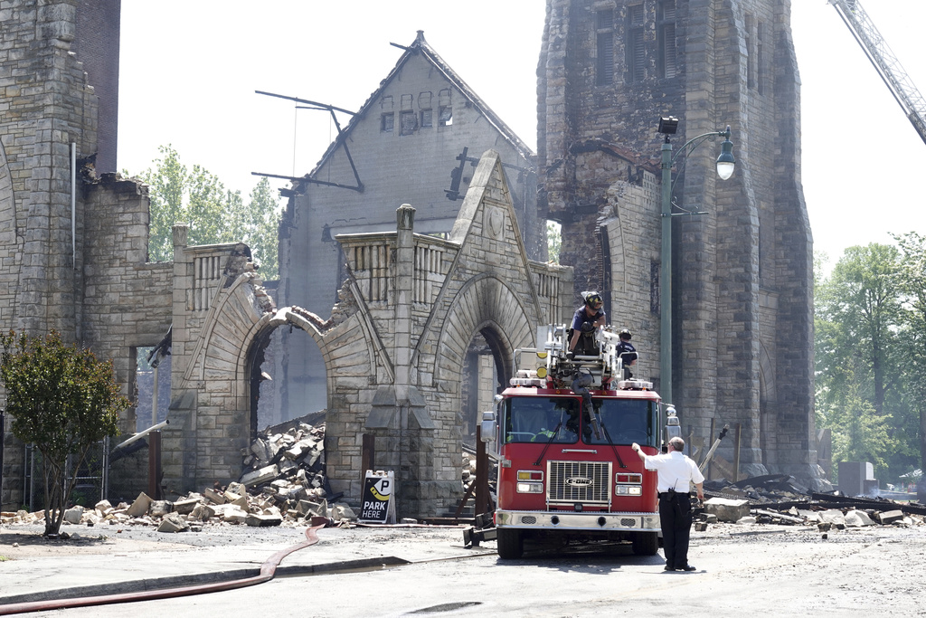 Firefighters douse the historic Clayborn Temple, a landmark from the civil rights movement with ties to Martin Luther King Jr.