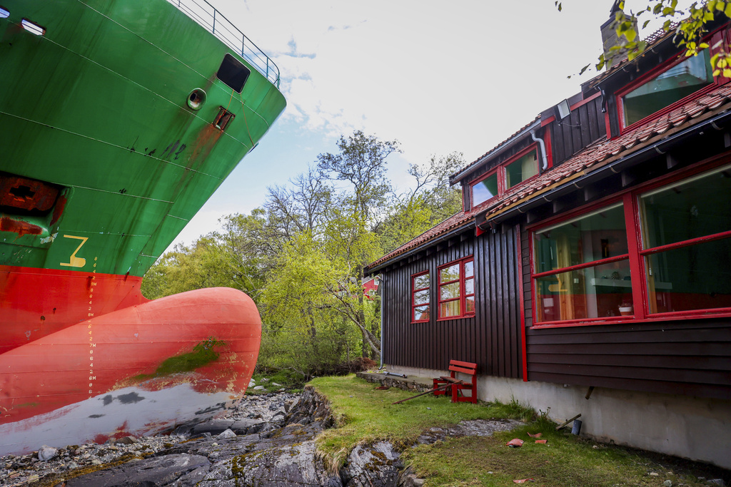 The container ship NCL Salten is seen next to Johan Helberg