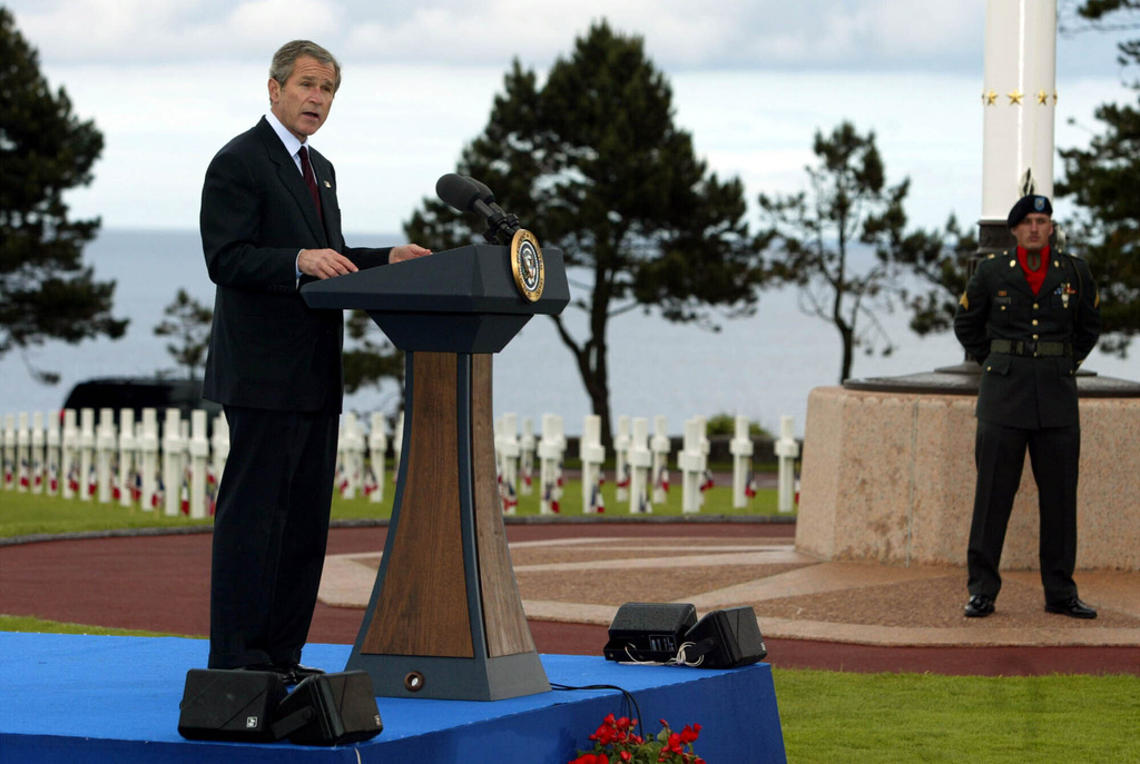 President George W. Bush addresses veterans and others gathered at the Normandy American Cemetery