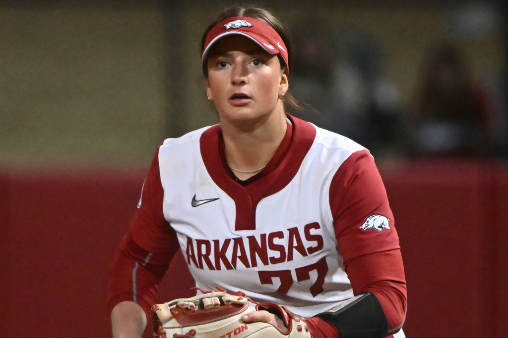 Arkansas Bri Ellis (77) takes a throw against Wichita State during an NCAA softball game