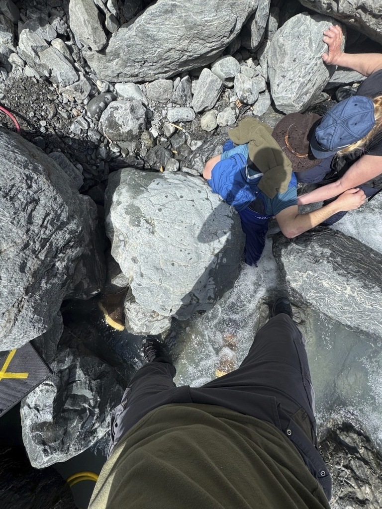 Kell Morris, upper right in a brown hat, trapped under a 700 pound rock near Seward, Alaska