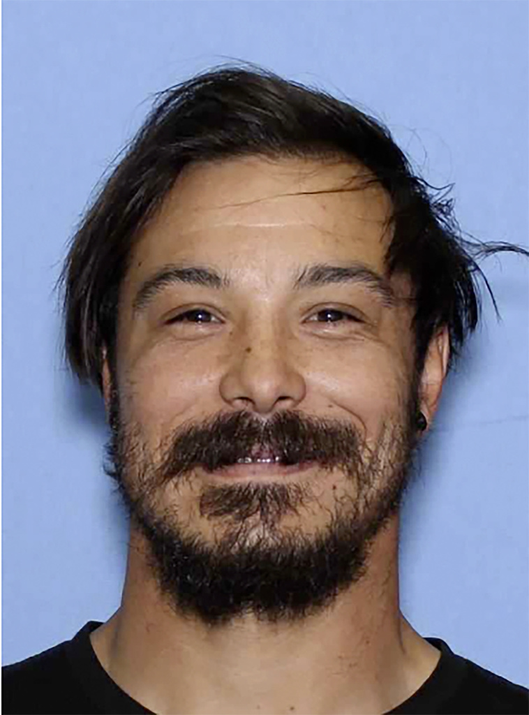 Travis Caleb Decker who the police are asking the public for help in locating the Washington state father who is wanted