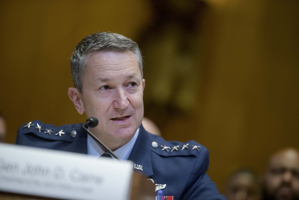 Gen. John D. Caine, chairman of the Joint Chiefs of Staff, testifies during a Senate Committee on Appropriations subcommittee hearing