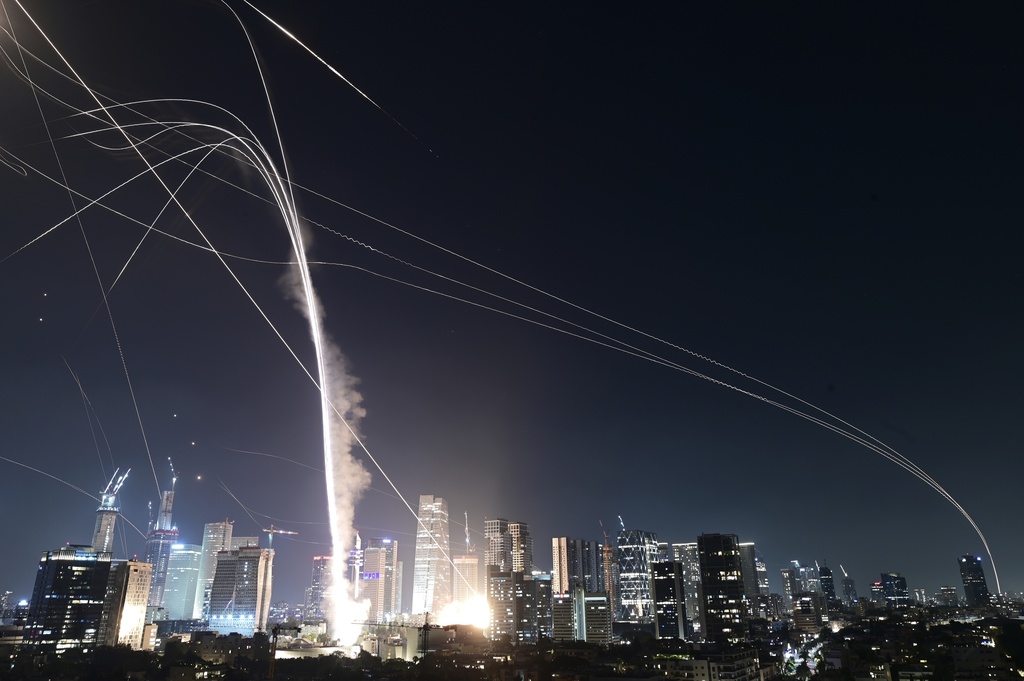 Israeli Iron Dome air defense system fires to intercept missiles over Tel Aviv, Israel