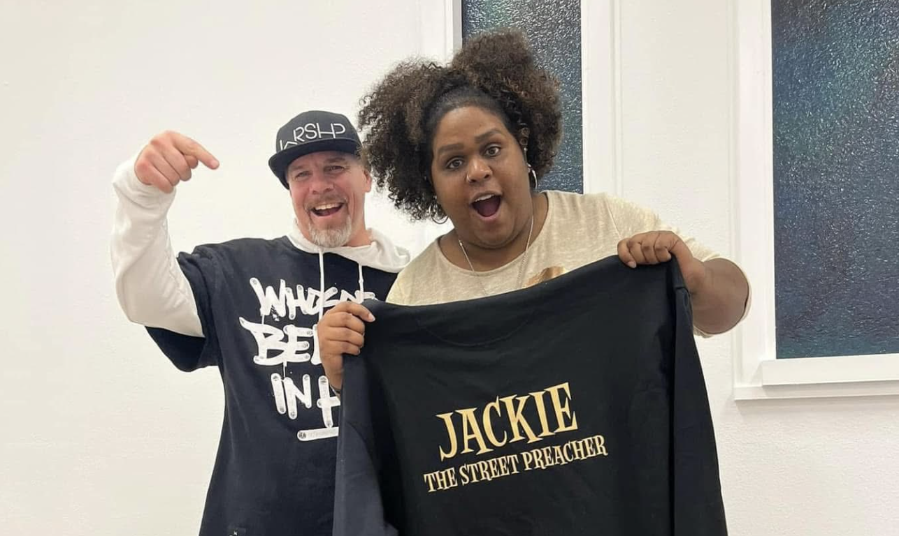 Two people smiling excitedly