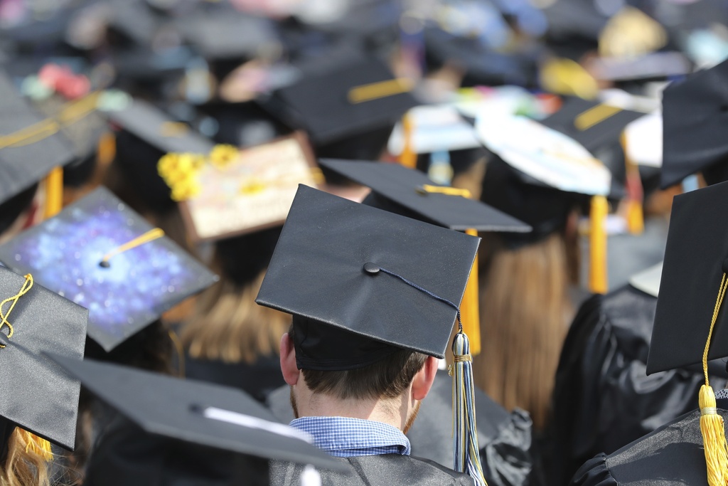 Graduates at the University of Toledo appear at commencement ceremonies