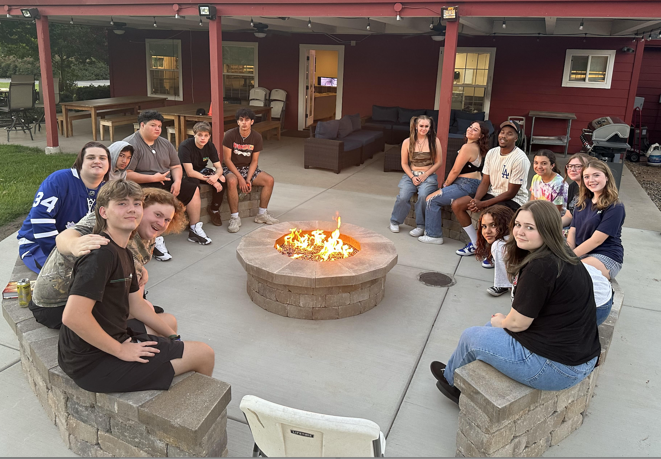Kids around a firepit