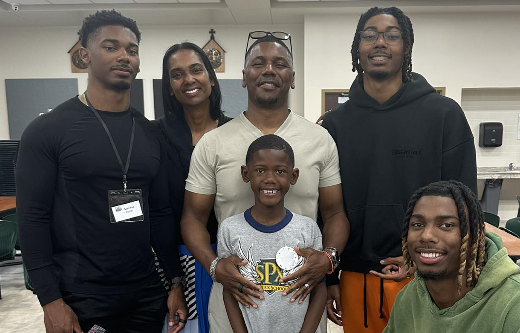 Man, wife and four sons