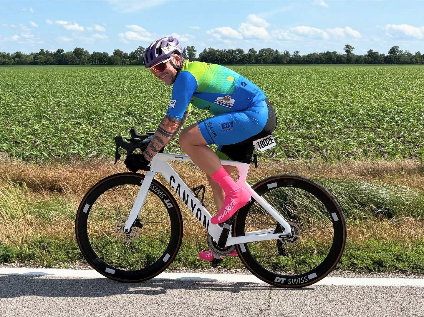 ZOE Competitor Smiling As He Cycles To End Child Trafficking