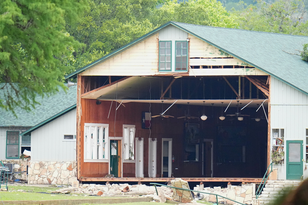 A wall is missing on a building at Camp Mystic along the banks of the Guadalupe River