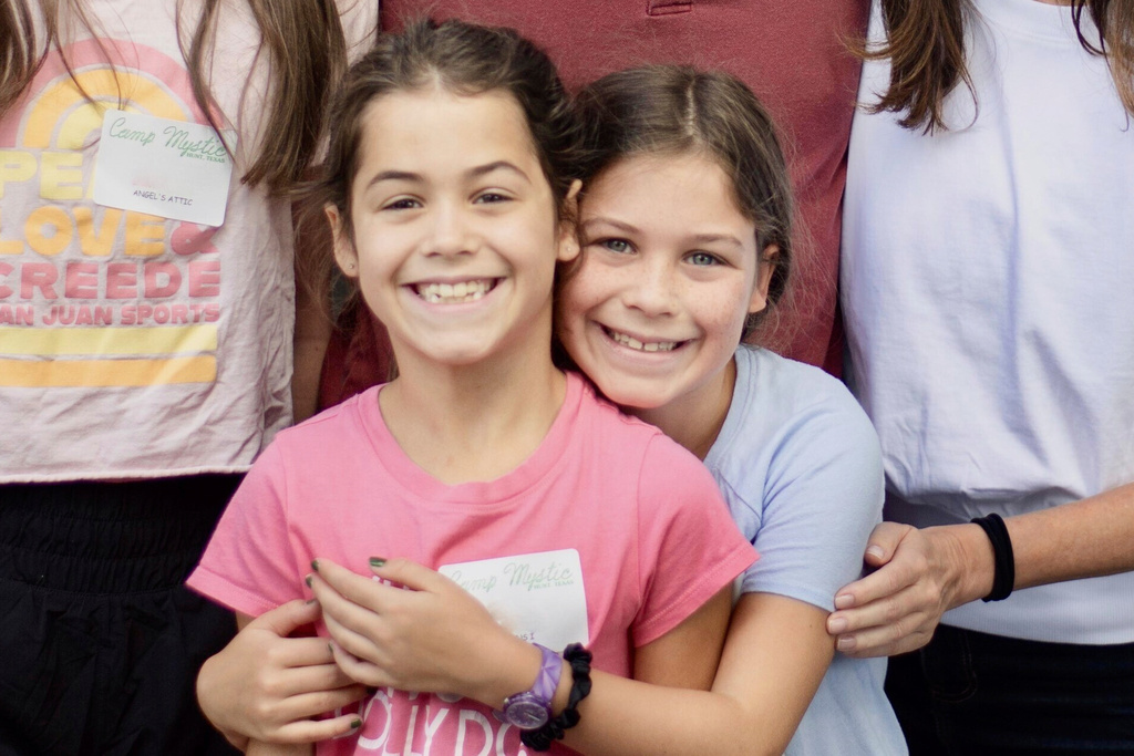 Twin sisters, Hanna Lawrence, left, and Rebecca Lawrence, right, who were two the people who lost their lives in the flooding at Camp Mystic