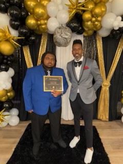 Dr. White presented a leadership award to PSUGA Pan-African Student President Quentin Moon.