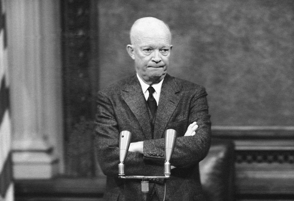 President Dwight Eisenhower ponders a question from a reporter during a meeting with the press in Washington, D.C., Jan. 19, 1956