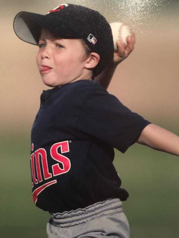 Eeles as a young boy wearing a Minnesota Twins jersey.