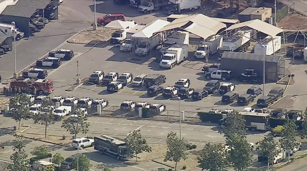 Police and emergency vehicles are in place at the scene of a blast at the Biscailuz Center Training Academy in East Los Angeles 