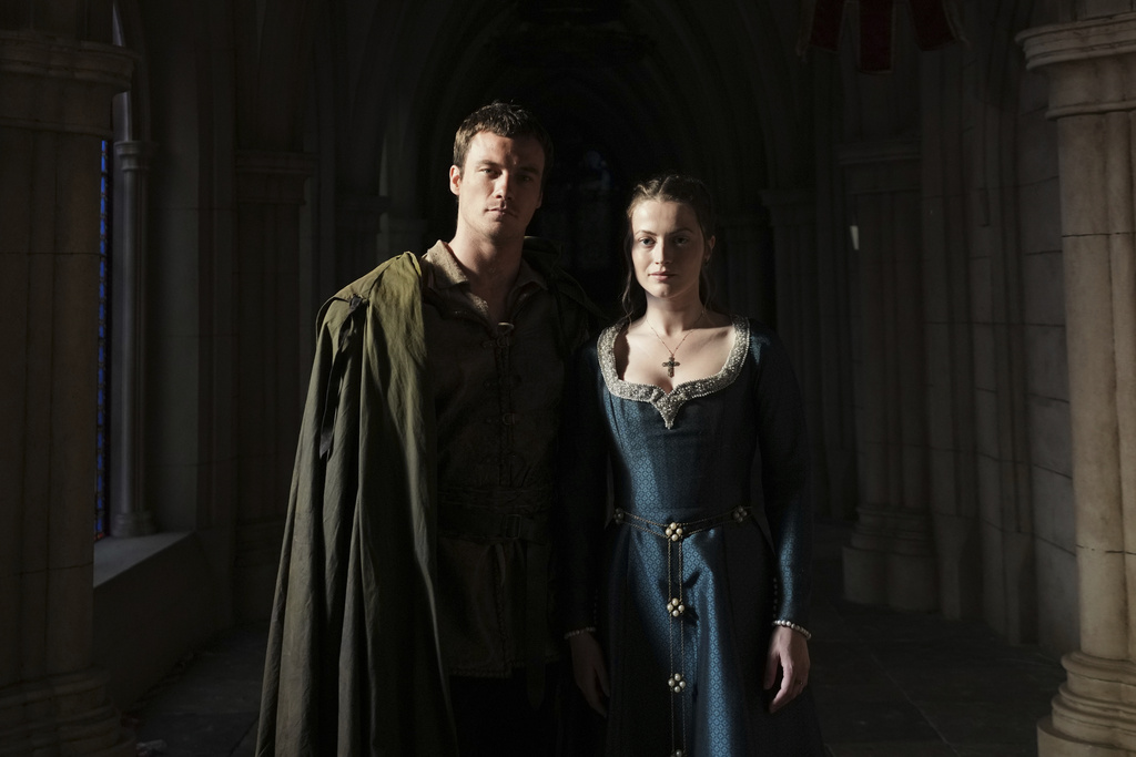 Actor Jack Patten as Robin, left, poses with actor Lauren McQueen as Marian 