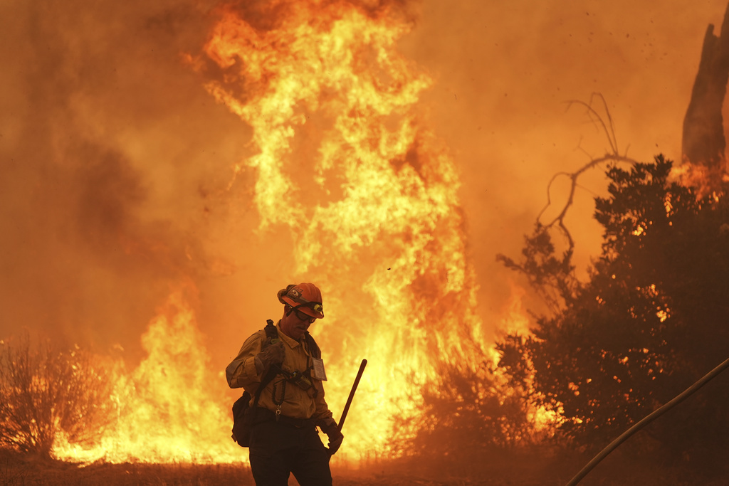 Firefighter battles the Canyon Fire 