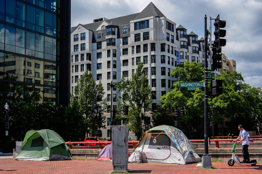 Homeless tents are set up on a sidewalk near George Washington University, D.C.