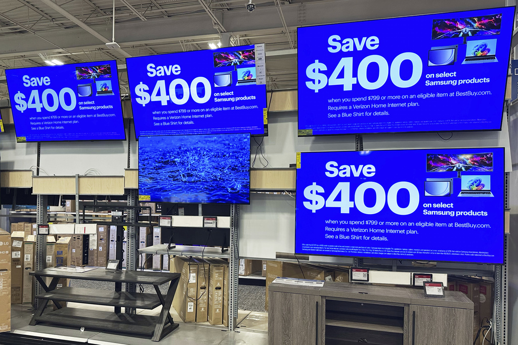 Flat screen TVs are displayed at a retail store in Vernon Hills, Ill.