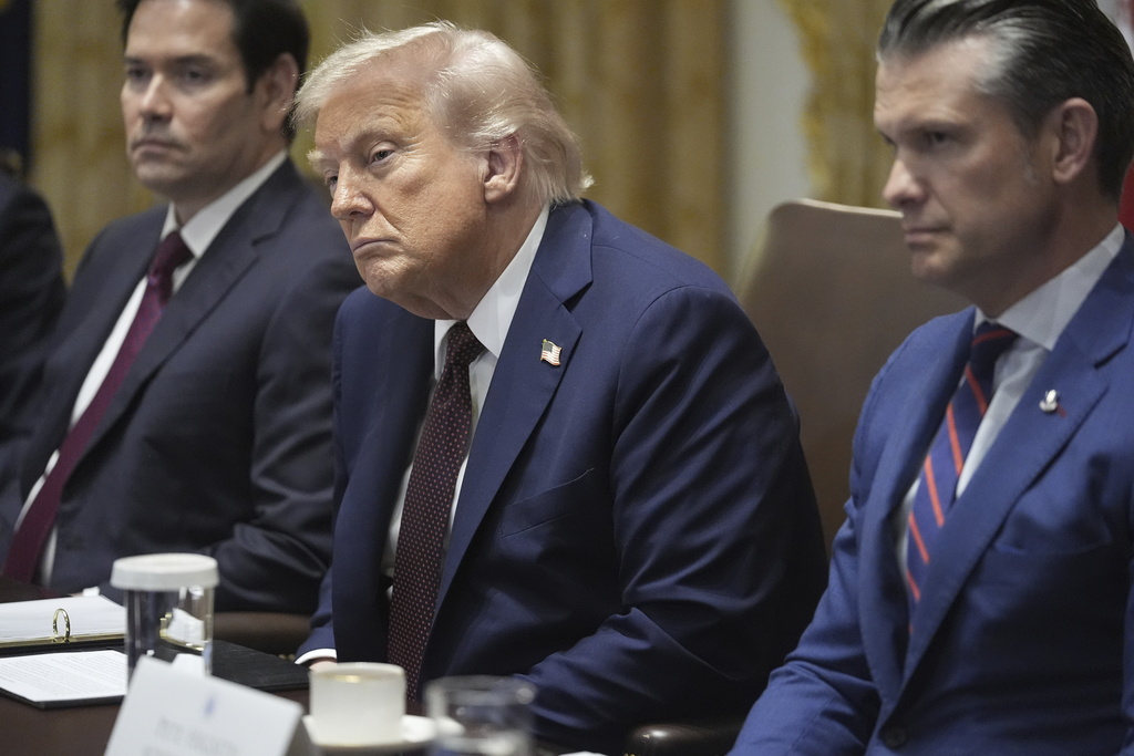 President Donald Trump, Secretary of State Marco Rubio, left, and Secretary of Defense Pete Hegseth, right