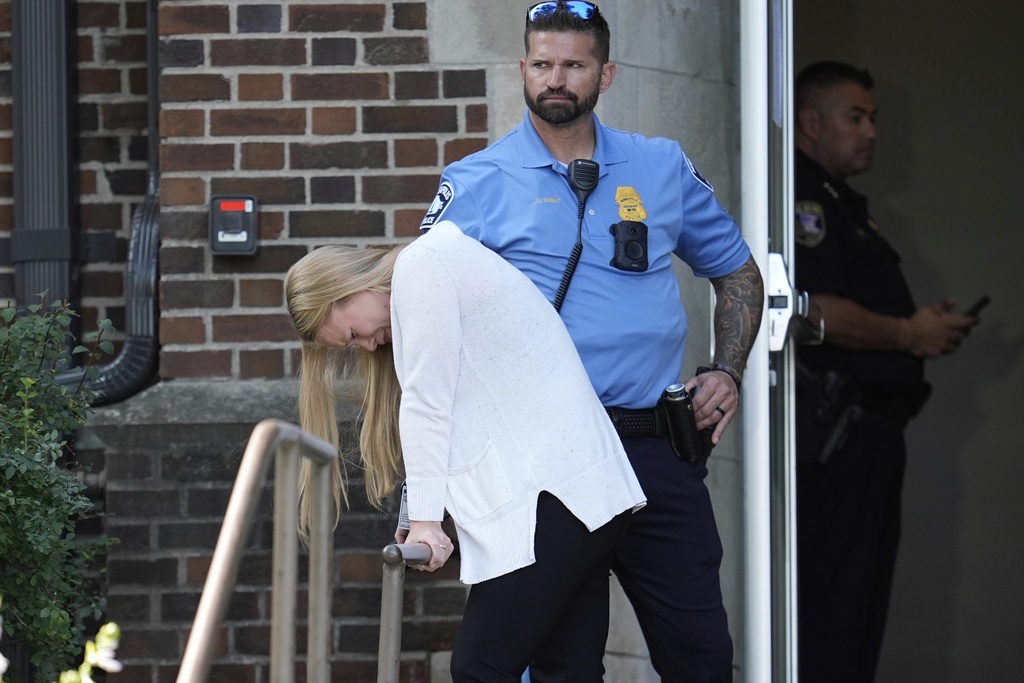 A person walks out of the Annunciation Church