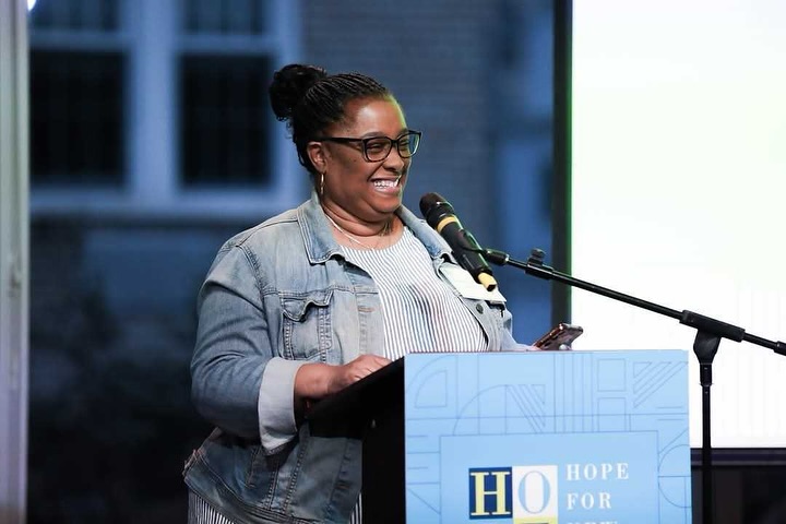 Adriene Perry, the regional coordinator for YoungLives New York City and Long Island, speaks at a Hope for New York event in May, 2025.