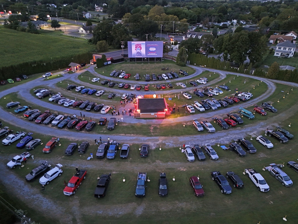 The sunsets on the Shankweiler Drive-In as previews run before the feature film
