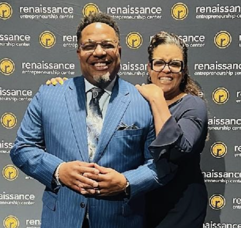 Pastor Tim and his wife Vanessa standing up and smiling