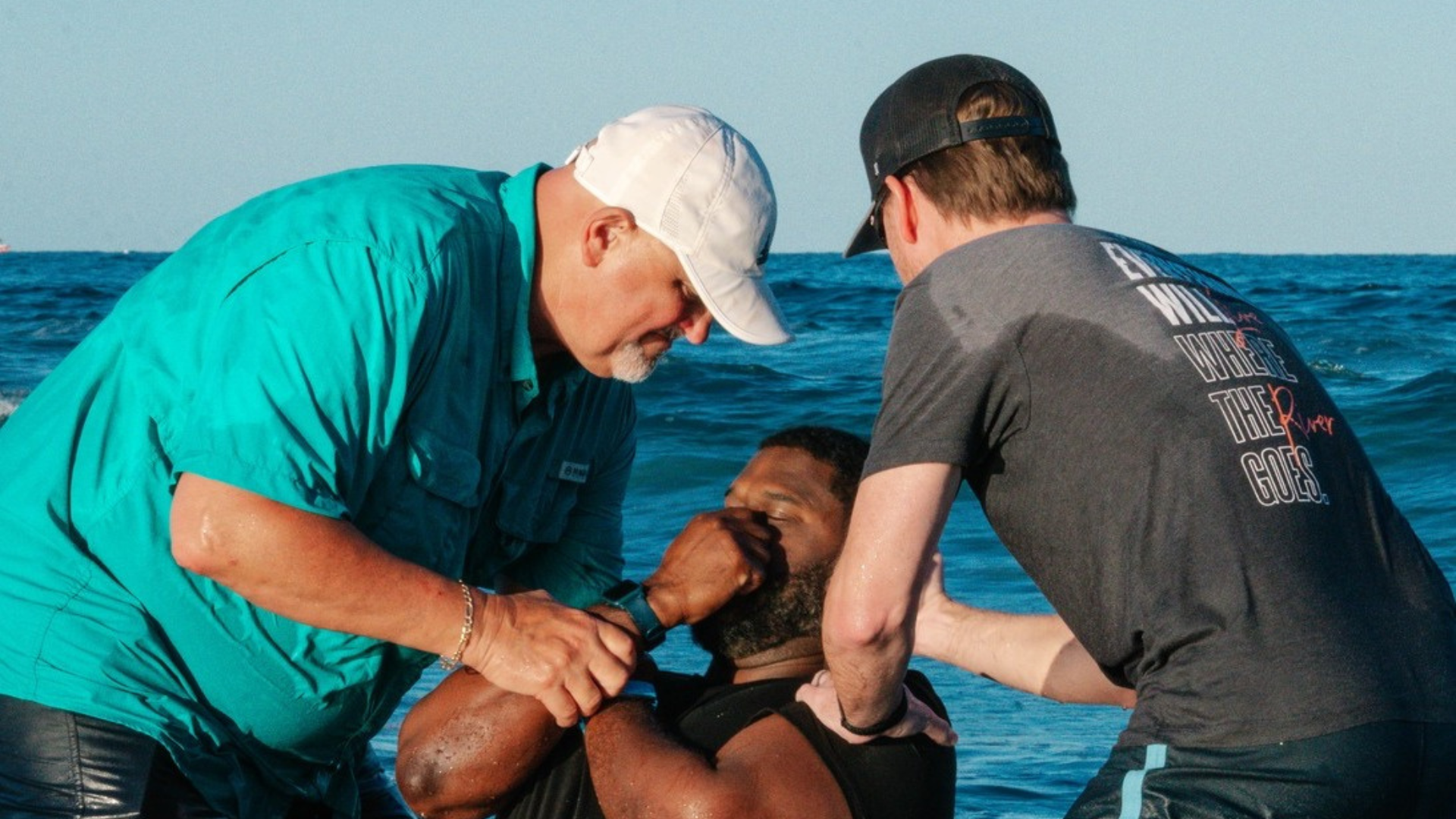 Pastor David Cassidy baptizing a new believer in the Atlantic Ocean.