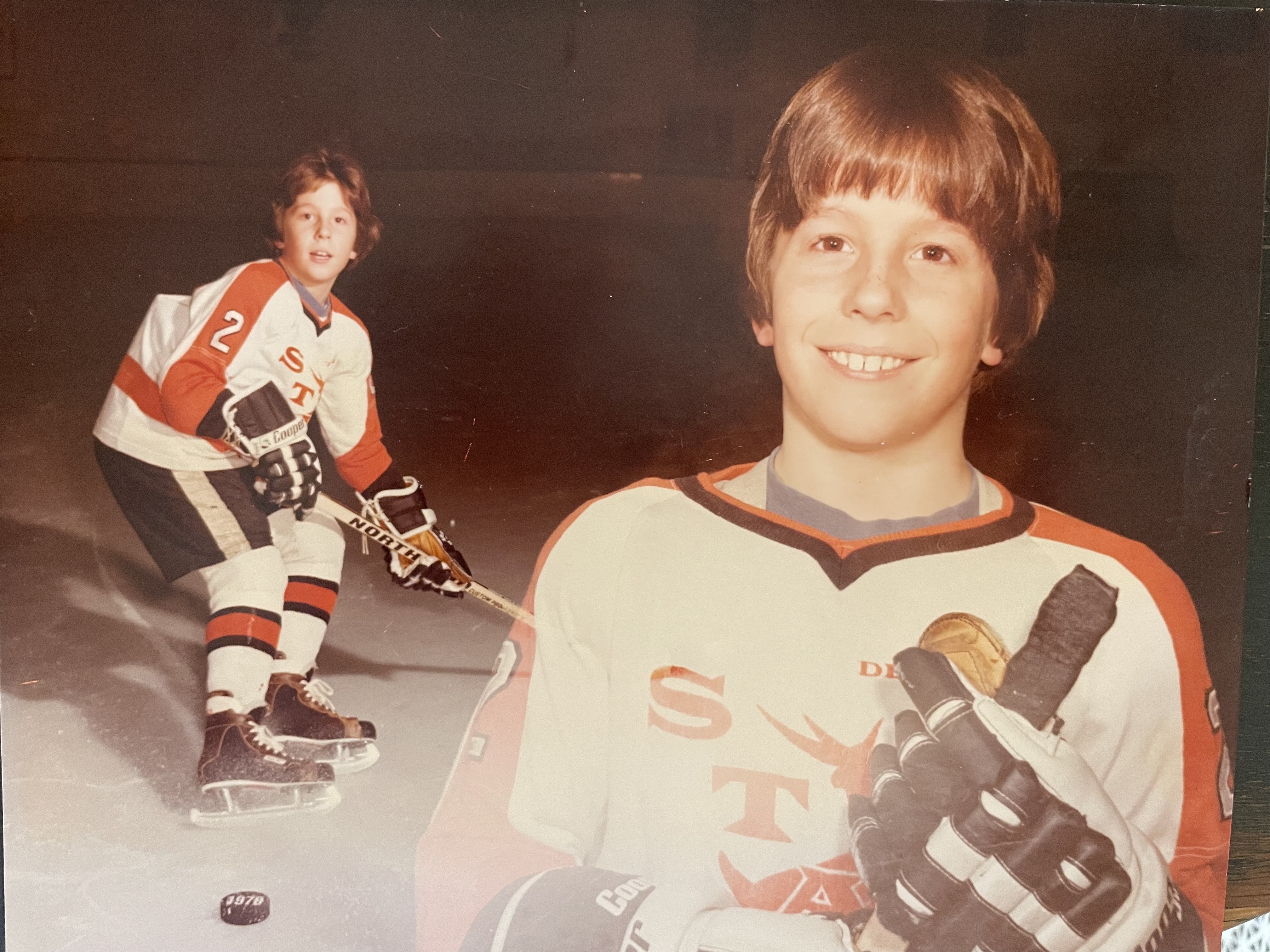 Young Adam Burt playing hockey
