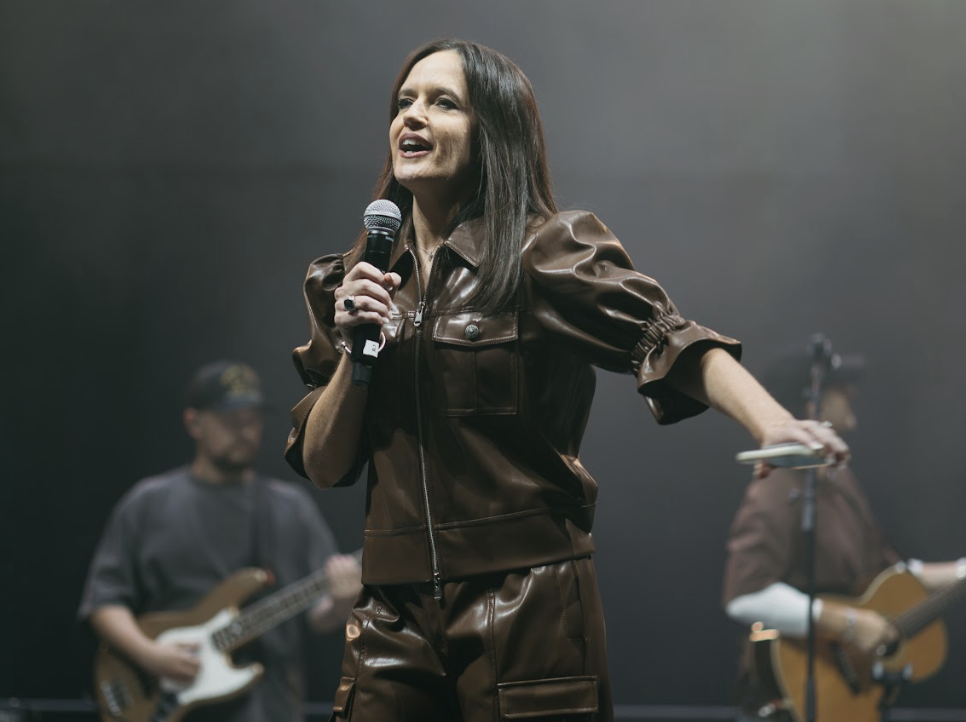 Woman with microphone on stage