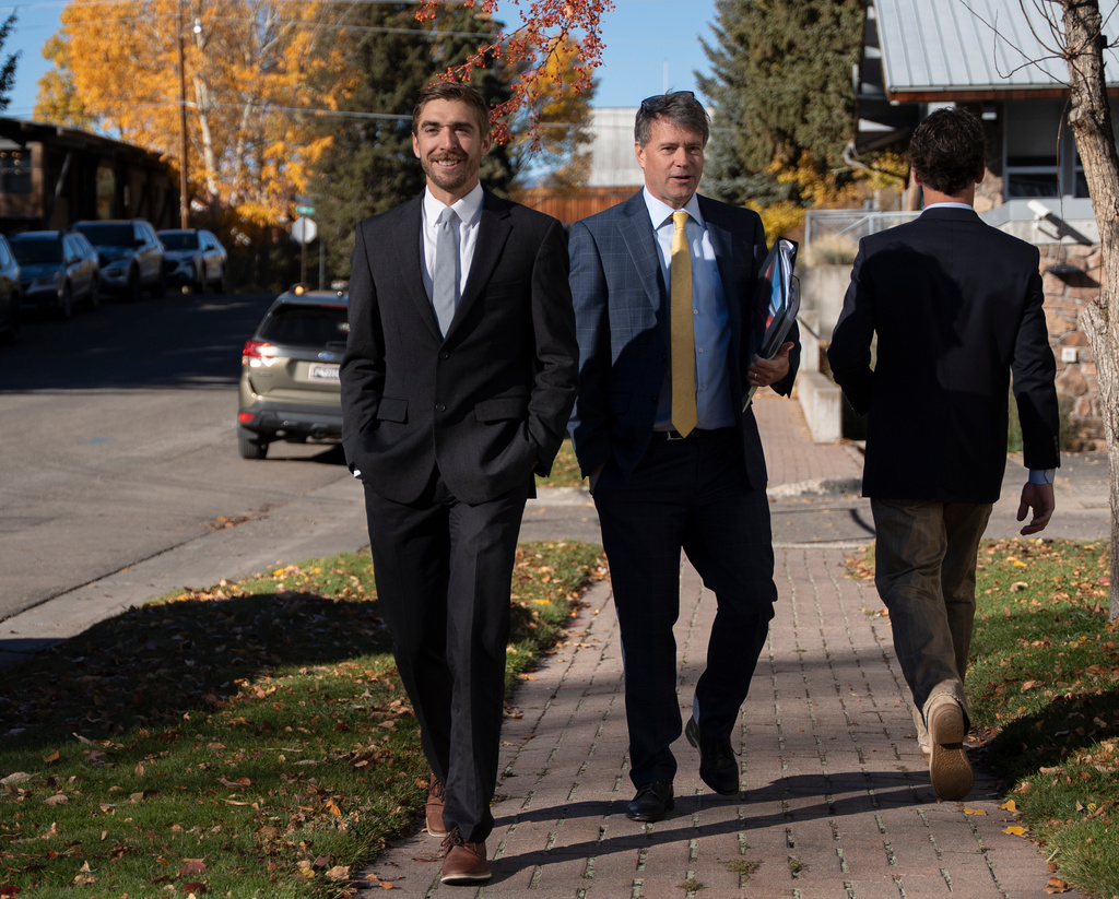 Michelino Sunseri, left, and his attorney Ed Bushnell walk toward the Clifford P. Hansen Courthouse