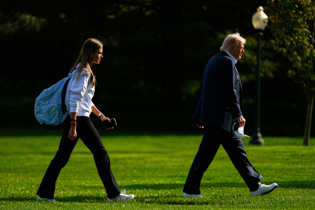 President Donald Trump with his granddaughter Kai Trump at the White House