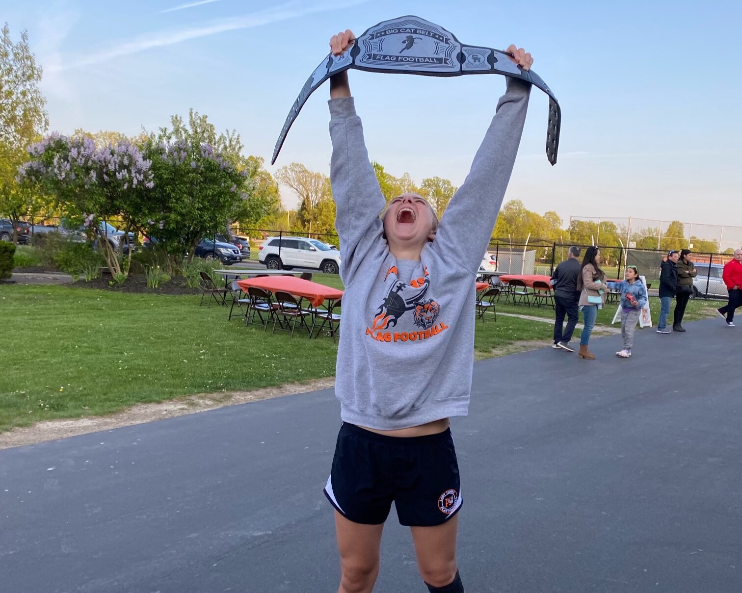 Viv Kuliecza holding the Big Cat Belt