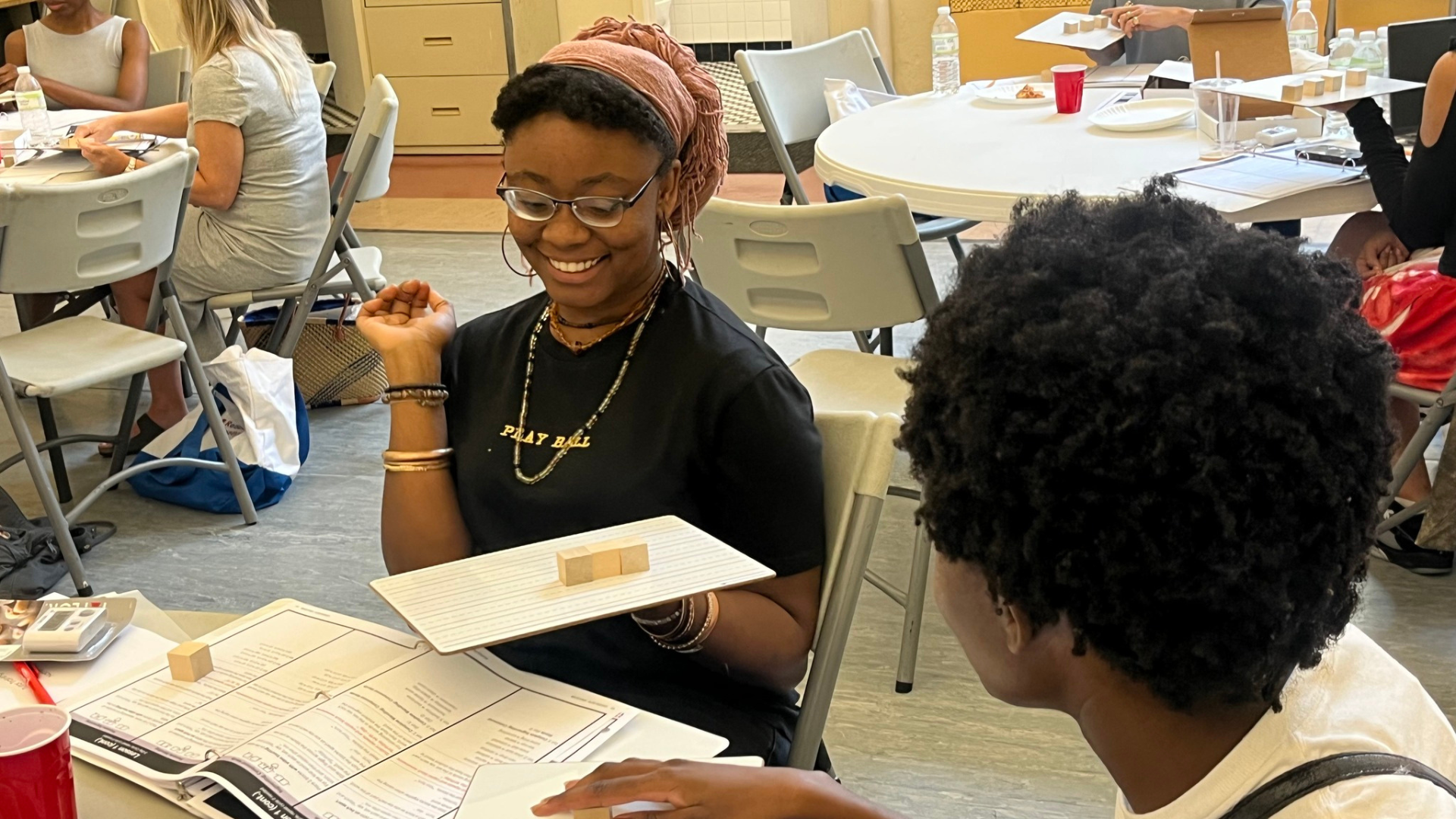 Harlem Literacy Project volunteers during a reading mentor training session.