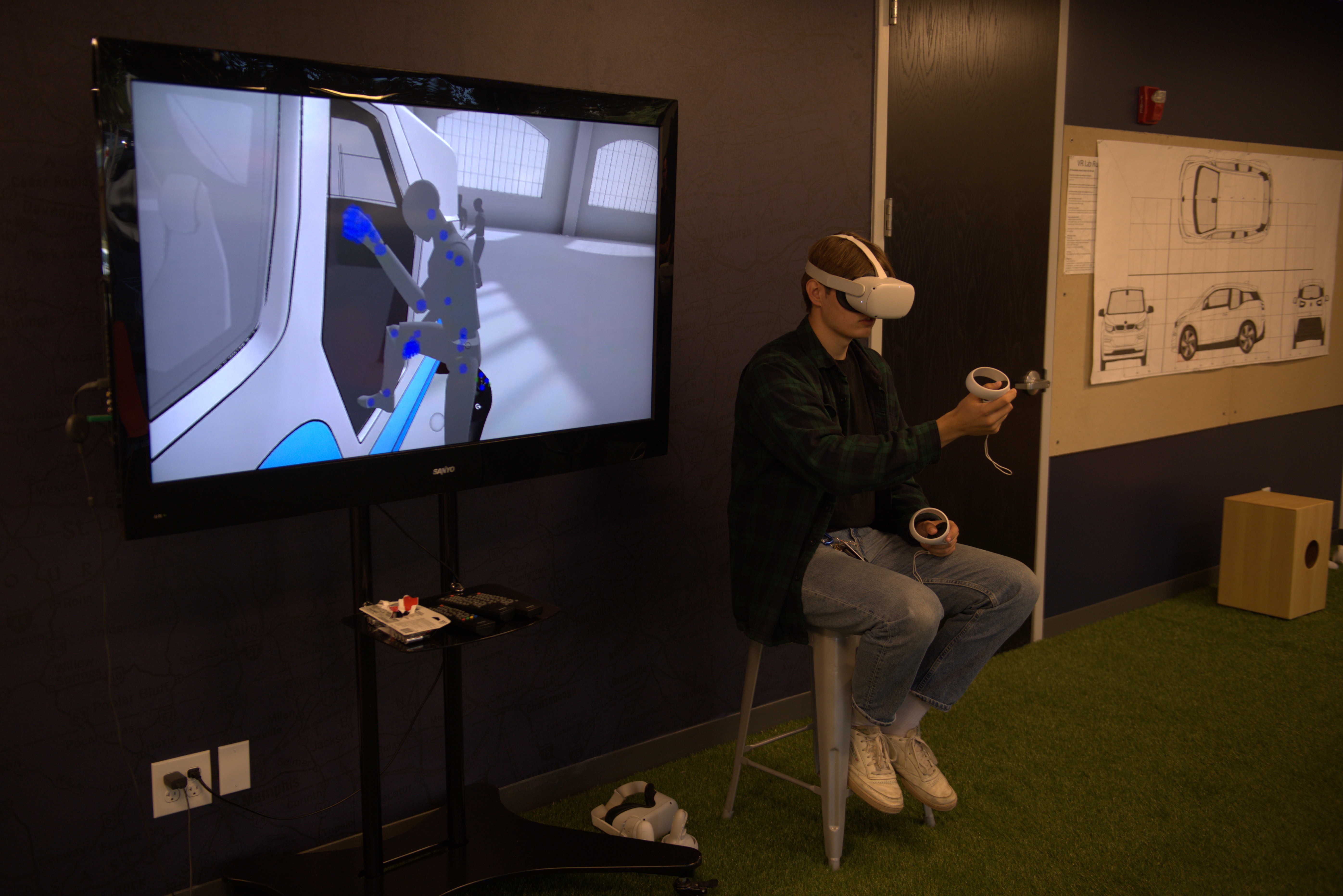 VR MODELING — A Cedarville student wears a virtual reality headset while overlaying a digital sketch on their clay model in augmented reality