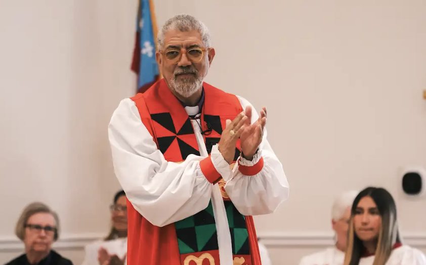 Man in vestments teaching church