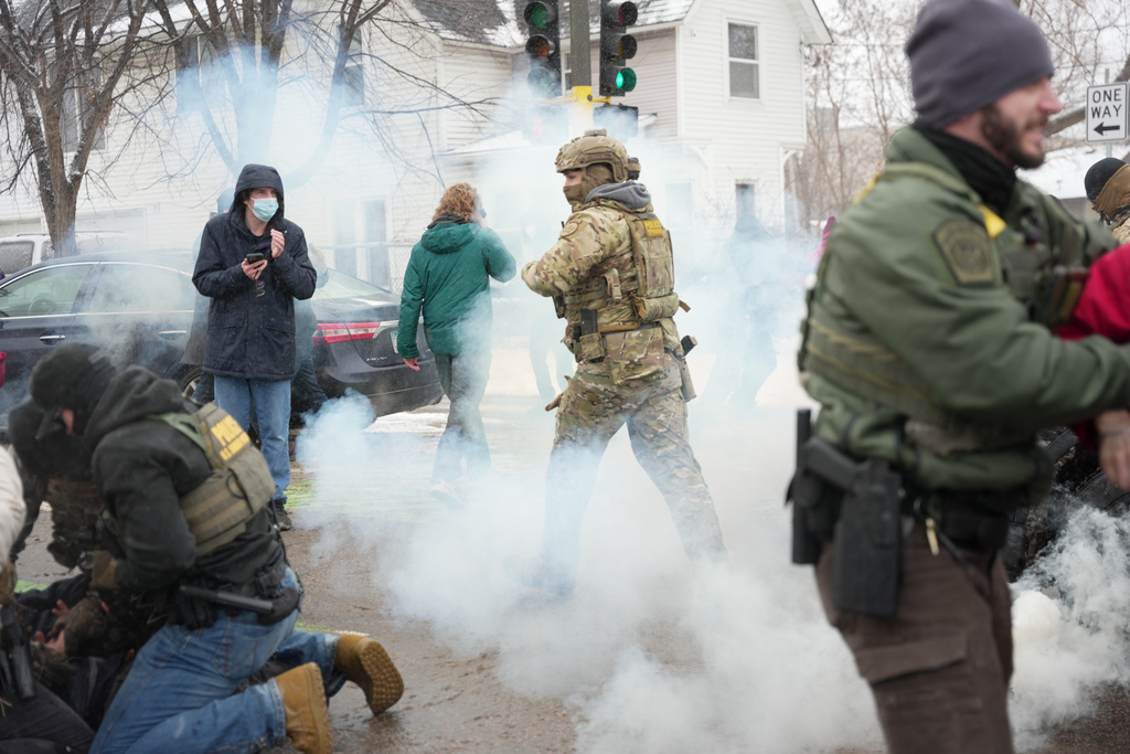 Tear gas is deployed as Federal agents make arrests in Minneapolis
