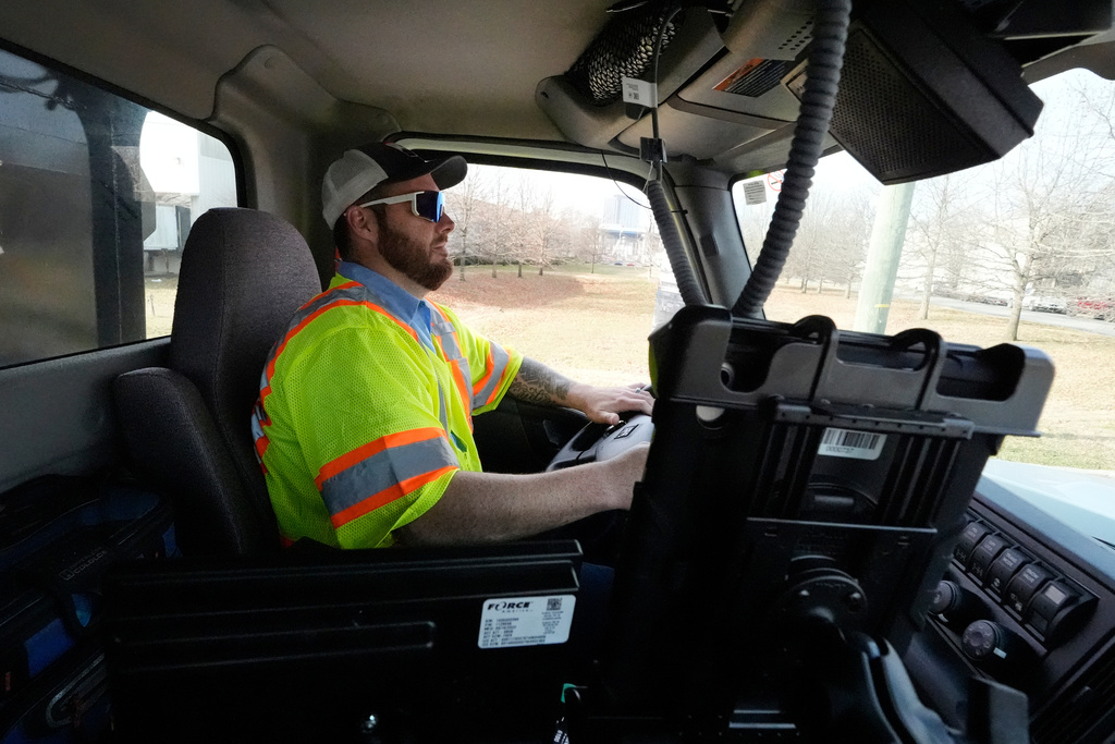 Austin Felts of the Nashville Department of Transportation drives a truck deploying salt brine on roadways 